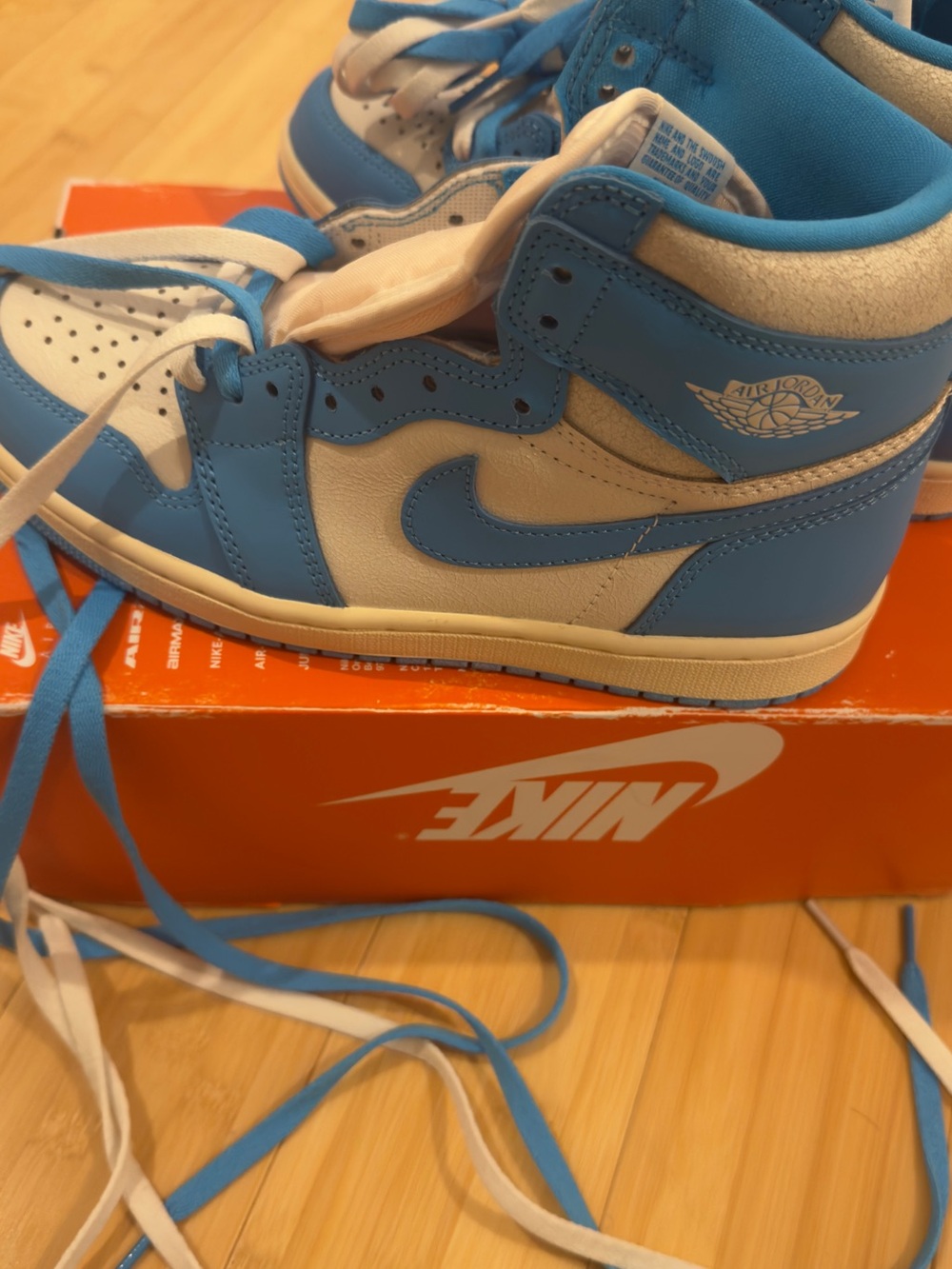 Jordan 1 Kids Blue and White High-Top Sneakers